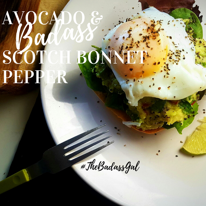 Avocado with scotch bonnet pepper and poached eggs on toast